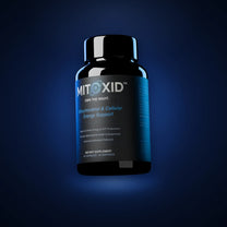 Mitoxid bottle floating on a midnight ground, front label