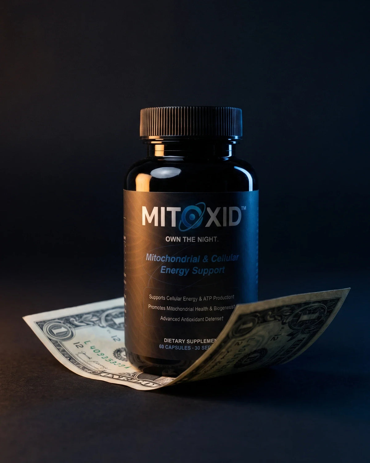 A Mitoxid bottle standing on a single US one-dollar bill